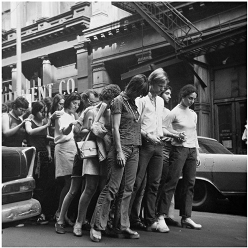 Street Action (M-Walk), 1970 (Yvonne Rainer, Douglas Dunn, Sarah Rudner in the first row). Photographer unknown; © The Getty Research Institute, Los Angeles (2006.M.24)